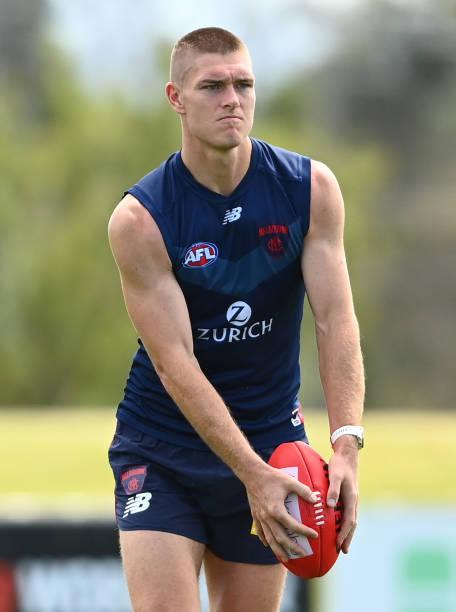 adam-tomlinson-of-the-demons-kicks-during-a-melbourne-demons-afl-at-picture-id1357371880.jpg