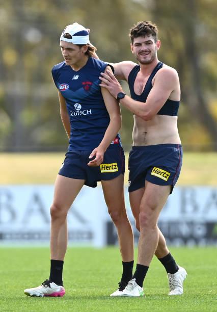 blake-howes-of-the-demons-is-congratulated-by-angus-brayshaw-of-the-picture-id1357367738.jpg